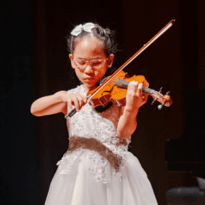 Asian student learning violin with teacher during violin lessons in Singapore at LVL Music Academy